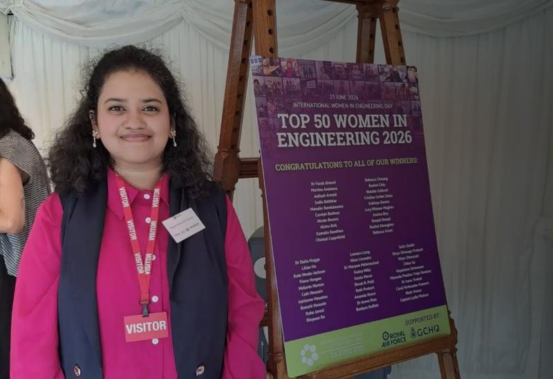 Sai Nayantara standing next to  a list of WES 2026 winners