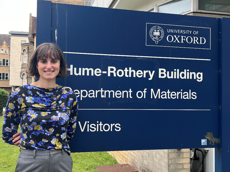 Professor Hannas Stern standing by the department's main sign