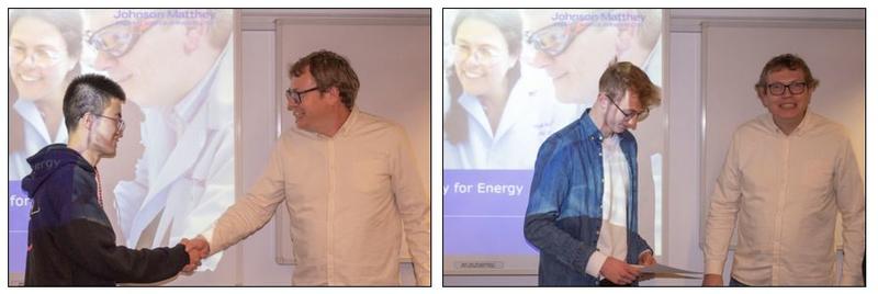 Ruidong Zhou, James Bennett and Dr Geoff Spikes shaking hands with a Johnson Matthey promotional screen behind them